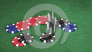 Poker chips falling on table