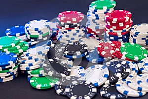 Poker chips isolated on black background