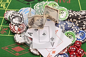 Poker chips, money,playing cards