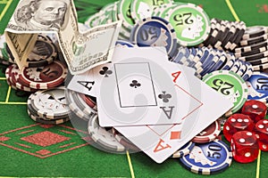 Poker chips, money,playing cards