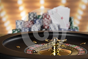 Poker Chips, Roulette wheel in motion, casino background