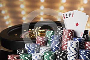 Poker Chips, Roulette wheel in motion, casino background