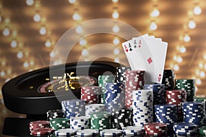 Poker Chips, Roulette wheel in motion, casino background