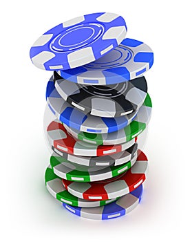 Poker gambling chips falling in pile top view