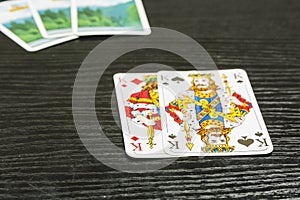 Poker game - there are two kings in the exposed playing cards.