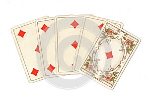 A poker hand of antique playing cards showing a straight flush of diamonds.