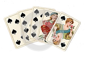 A poker hand of antique playing cards showing a straight flush of spades.