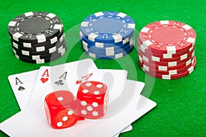 Poker hand of four aces playing cards and chips