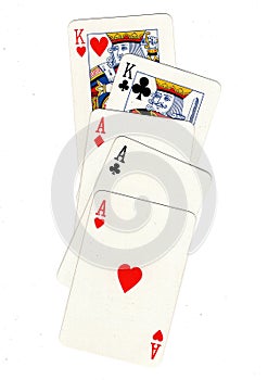 A poker hand of playing cards showing a full house.