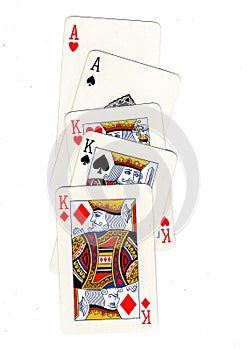 A poker hand of playing cards showing a full house.