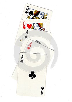 A poker hand of playing cards showing a full house.