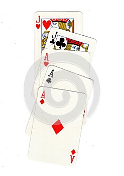 A poker hand of playing cards showing a full house.