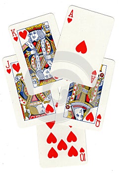 Poker hand of playing cards showing a royal flush.