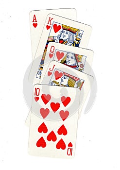 A poker hand of playing cards showing a royal flush.