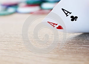 Poker hand with two aces and chips