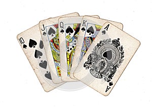 A poker hand of vintage playing cards.