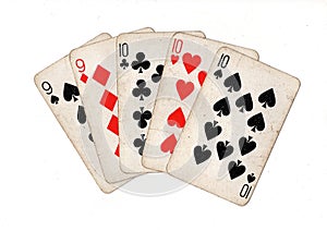 A poker hand of vintage playing cards.