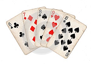 A poker hand of vintage playing cards.