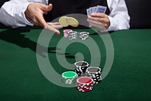 Poker player increasing his stakes