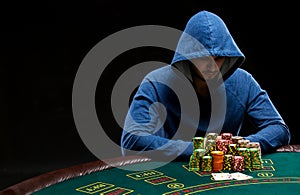 Poker player looking at combination of two aces. Closeup