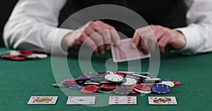 Poker player pulling in a pile of chips, large win, jackpot, successful game. Fortune, luck, gambling . Successful player stacking