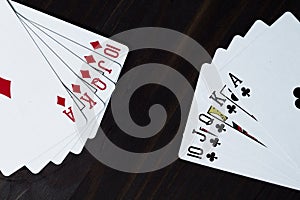 Poker. Playing cards on black background. Royal flush