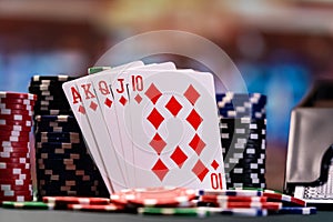 Poker royal flush with casino chips