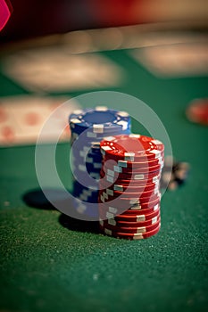 Poker table scene two aces and stacked chips displayed strategically on green baize photo