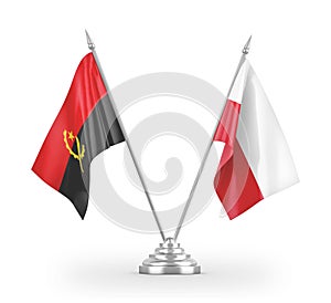 Poland and Angola table flags isolated on white 3D rendering