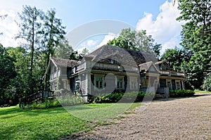 Poland, Bialowieza Palace Park. Old wooden, historic hunters manor house. Oldest building in Bialowieza.