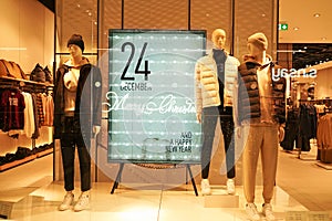 POLAND, BYDGOSZCZ - December 21, 2021: Male mannequins near stand in store. Merry Christmas and happy New Year.