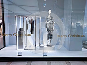 POLAND, BYDGOSZCZ - December 23, 2021: Showcase of fashionable clothes brand ZARA. Shop window at christmas eve and new