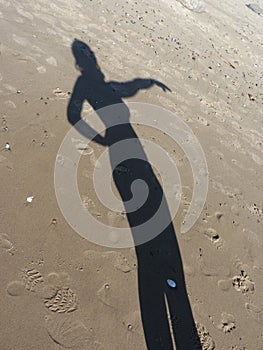 Poland, Wolin island - woman`s shadow.