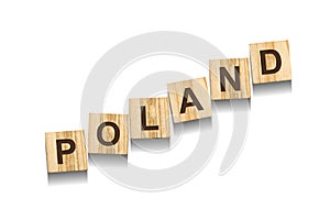 Poland, word on wooden blocks. Isolated on a white background