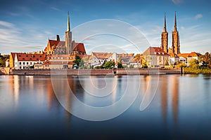 Poland, Wroclaw cityscape. Wroclaw historic old town by Odra river. The Cathedral of St. John the Baptist at the sunset.