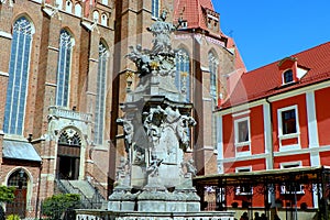 Poland, Wroclaw, Tumski island, monument of John of Nepomuk in front of Collegiate Church of the Holy Cross and St Bartholomew