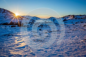 Polar arctic greenlandic sunset over the snow mountains, Nuuk, Greenland