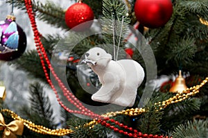 Polar bear. Christmas tree toy on the Christmas tree.