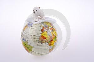 Polar bear on globe
