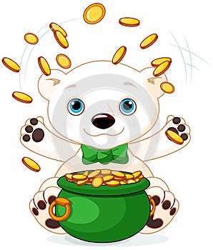 Polar Bear juggles gold coins photo
