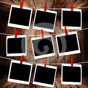 Polaroid frames hanging on rope