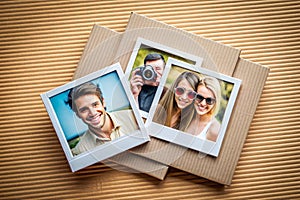 Polaroid style photo frames on cardboard photo