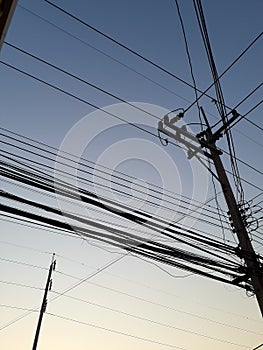 Pole Silhuettes Against Gradient Sky