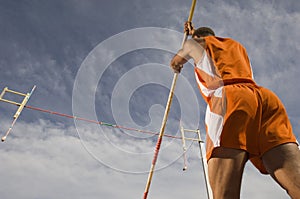 Pole Vaulter Preparing For A Jump