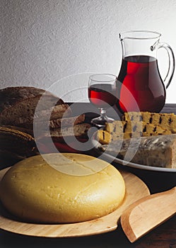 Polenta and gorgonzola cheese on table photo