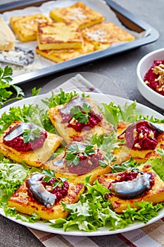 Polenta Squares with beetroot and anchovies