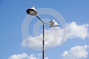 Poles led. Street light against the blue sky with clouds. copy space.