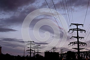 Poles and wires on the background of a beautiful evening sky