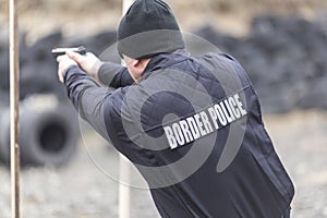 Police, army and border police gun training. firing weapons and pistols