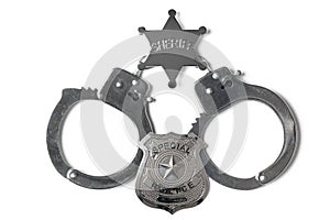 Police Badge Sheriff Star and Handcuffs - Stock Photo